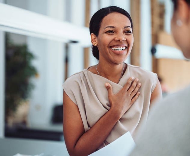 A woman smiling.